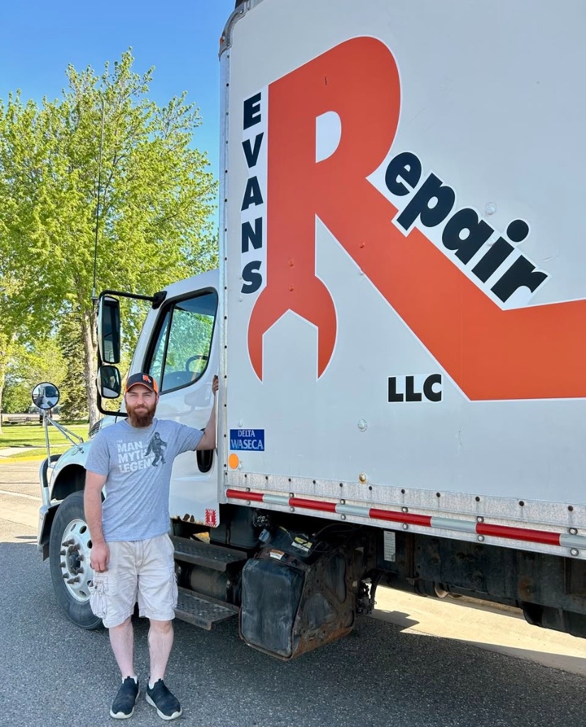 Evans Repair owner with mobile service truck